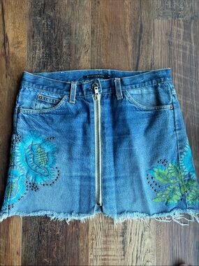 Embroidered Front-Zip Denim Mini Skirt with studs